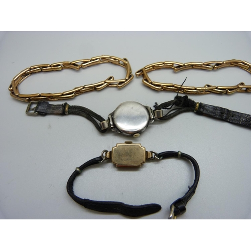 1041 - A 9ct gold wristwatch, a silver wristwatch and two plated sleeve garters