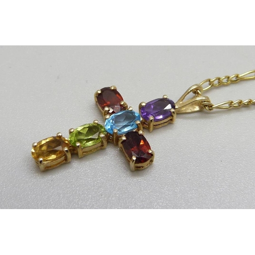 1042 - A 9ct gold multi gem set cross pendant on a 9ct gold chain, 2.9g