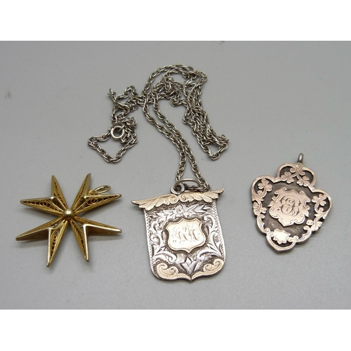 1053 - Two silver and gold fronted fobs, one with chain and a silver-gilt Maltese cross pendant