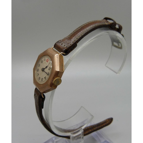 1065 - A 9ct gold cased lady's dress wristwatch