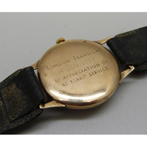 1078 - A 9ct gold Tudor Rolex wristwatch, London Transport related inscription,