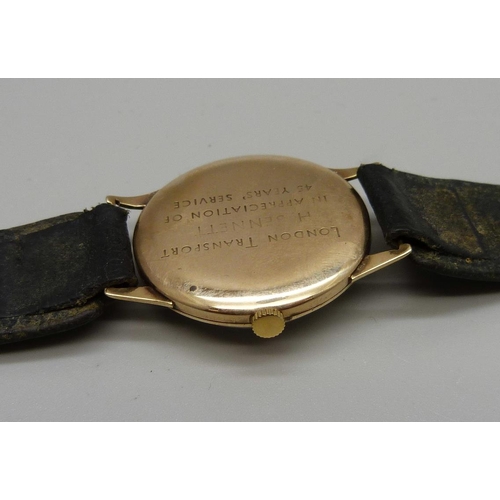 1078 - A 9ct gold Tudor Rolex wristwatch, London Transport related inscription,