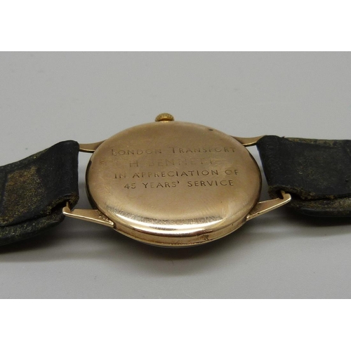 1078 - A 9ct gold Tudor Rolex wristwatch, London Transport related inscription,