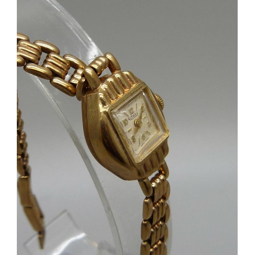 1079 - A lady's 9ct gold Rotary wristwatch, stamped 375, with box, total weight 18.1g