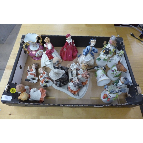 1119 - Three Royal Worcester figures, seven bird bells, three Neapolitan choir singers and a Capodimonte fi... 
