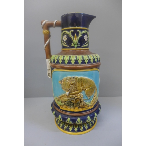 604 - A 19th Century George Jones majolica hunting themed ewer, hairlines to the top rim