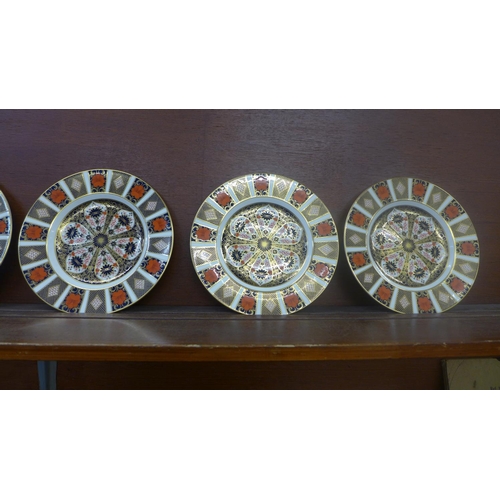 605 - Six Royal Crown Derby 1128 pattern side plates, seconds