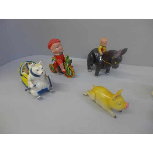 625 - Five plastic and tin plate toys