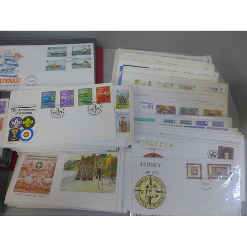 668 - Stamps; a tray of assorted first day covers in albums and loose