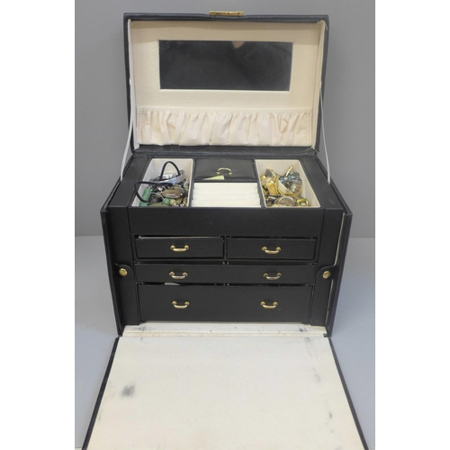 670 - Costume jewellery in black jewellery box