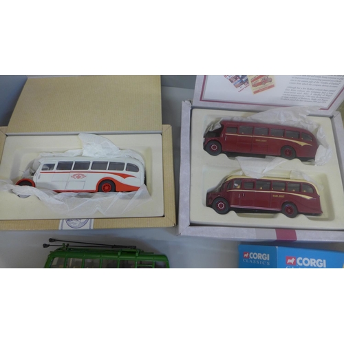 679 - Three Corgi buses, boxed and two boxed Atlas Editions model warships