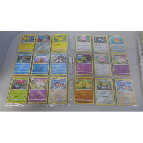 692 - 198 Assorted holographic Pokemon cards