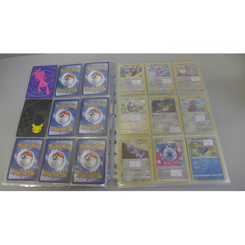 692 - 198 Assorted holographic Pokemon cards