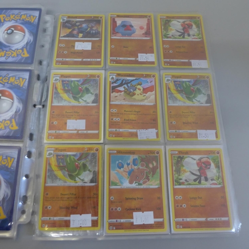 692 - 198 Assorted holographic Pokemon cards