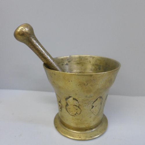 695A - A Georgian brass pestle and mortar