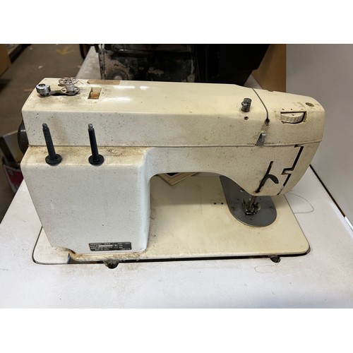 2406 - Toyota sewing machine on worktable