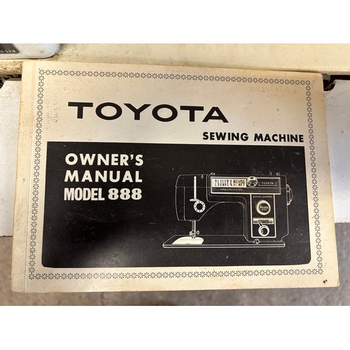 2406 - Toyota sewing machine on worktable