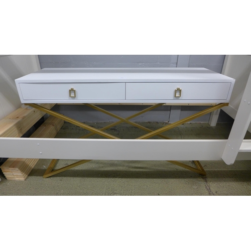 1643 - A white two drawer console with gold legs