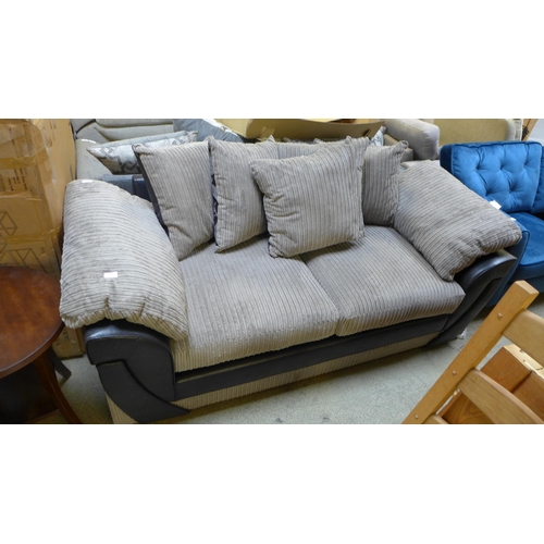 1651 - A black and mink three seater sofa