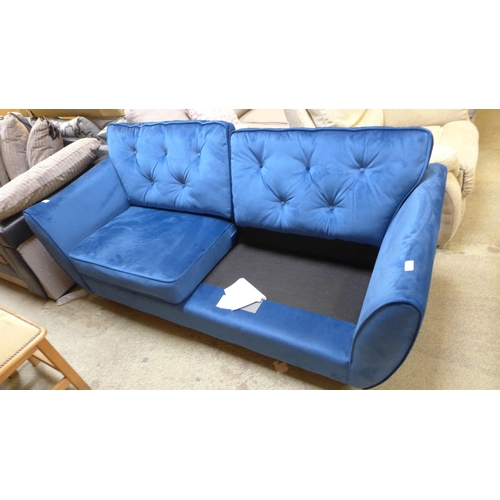 1661 - A Hoxton blue velvet two seater sofa - damaged, missing cushion