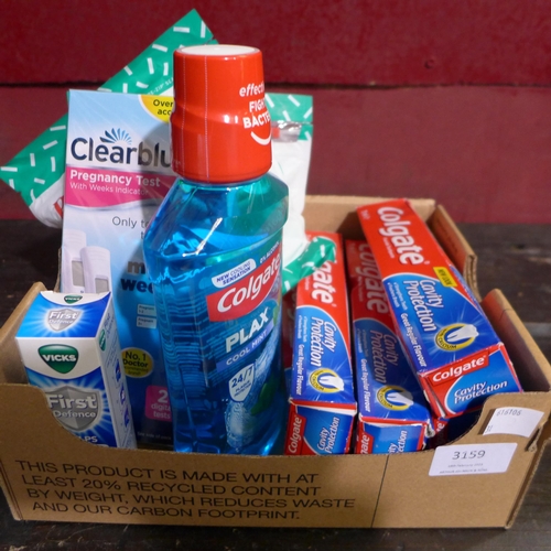 3159 - Quantity of toiletries including: Colgate toothpaste and mouthwash, dental flossers, ClearBlue pregn... 