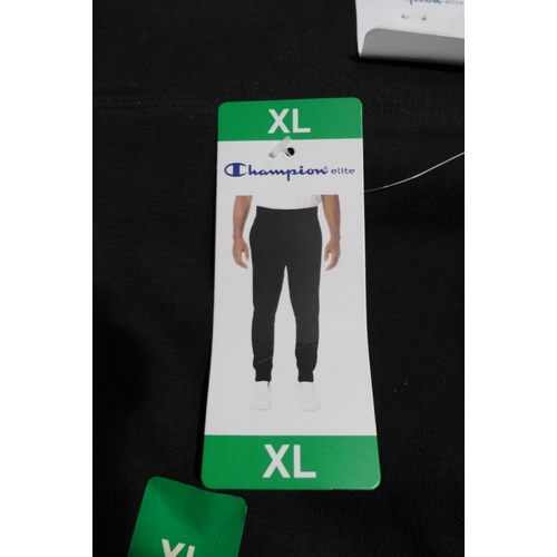 3224 - Bag of men's black XL Champion joggers * this lot is subject to VAT