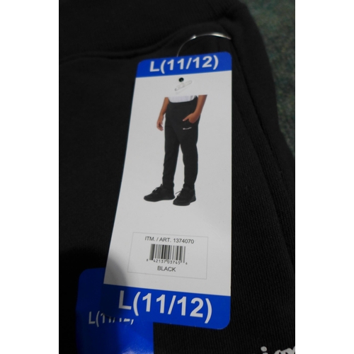 3228 - Bag of boy's black Champion joggers - mixed size * this lot is subject to VAT