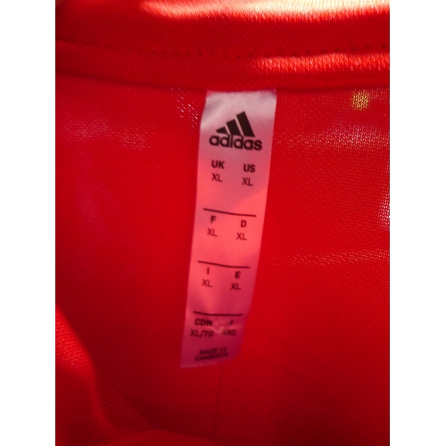 3240 - 2 Men's coats - Levi and Columbia and a red Adidas ¼ zip training top (XL) * this lot is subject to ... 