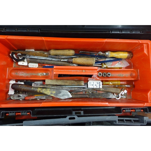 2075 - Two 66cm tool boxes one containing hand tools, one containing Bosch hammer SDS drill, circular saw a... 