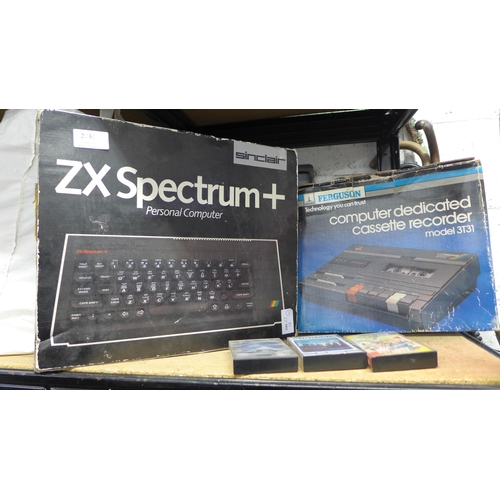 2235 - A Sinclair ZX Spectrum personal computer with games and original cassette recorder both boxed