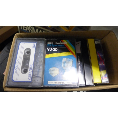 2235 - A Sinclair ZX Spectrum personal computer with games and original cassette recorder both boxed