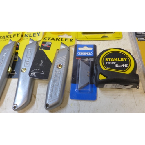 2245 - 15 Stanley, Blue Spot and Draper tools: knives, tape measures, spanners, screwdriver bit sets, etc.