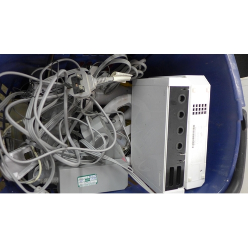 2310 - 3 Nintendo Wii consoles with leads, controllers and accessories including Wii Fit Board