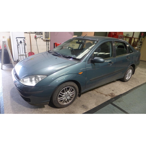 2493 - Ford Focus 1.6L LX petrol four door saloon with automatic transmission, new battery fitted. One owne... 