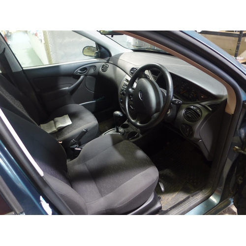 2493 - Ford Focus 1.6L LX petrol four door saloon with automatic transmission, new battery fitted. One owne... 