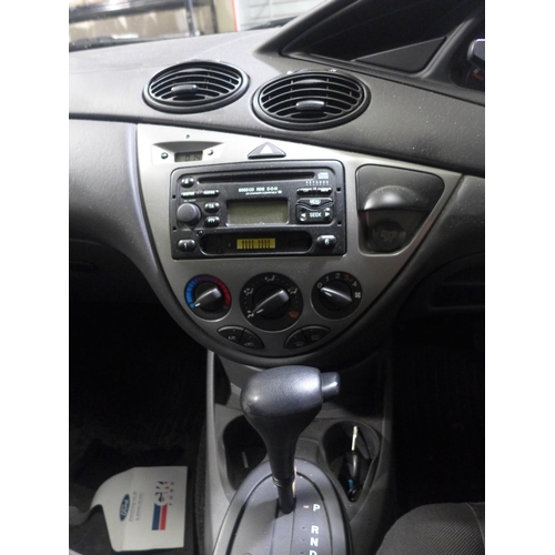 2493 - Ford Focus 1.6L LX petrol four door saloon with automatic transmission, new battery fitted. One owne... 