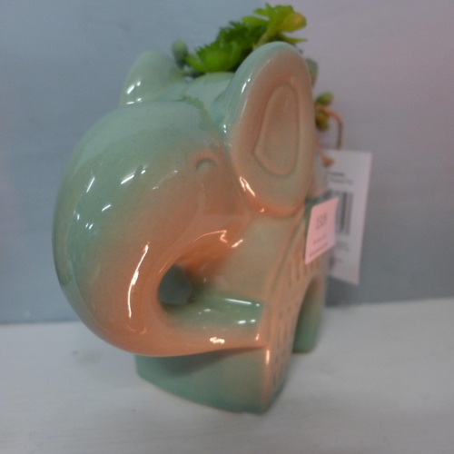 1328 - A faux succulent plant in a green ceramic elephant - H 17cms  (67689704 )