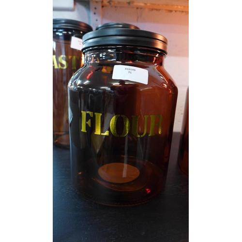 1331 - An amber glass flour jar - H 21cms (67840205)