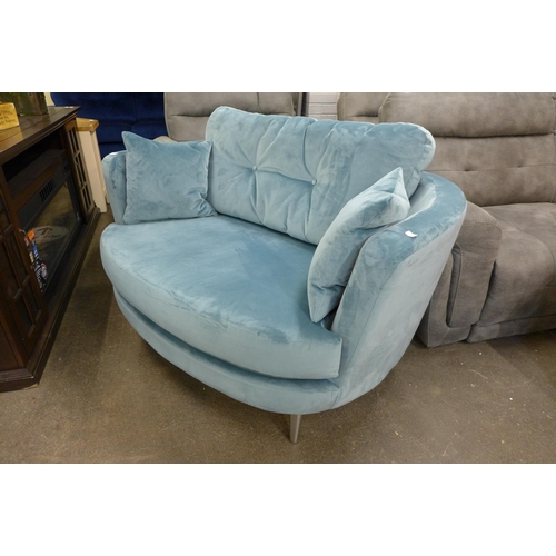 1517 - An ocean blue velvet button back love seat