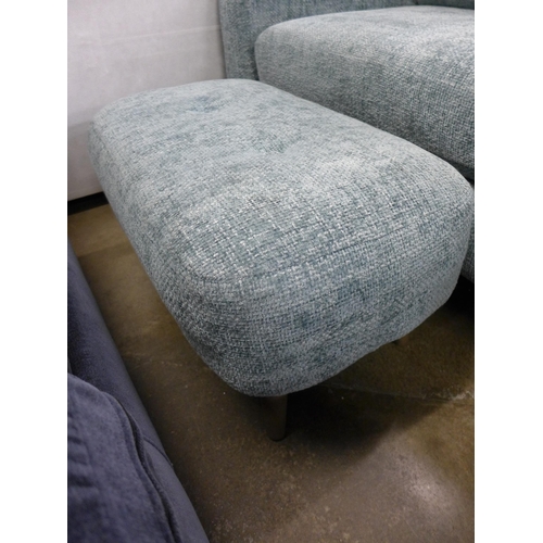 1534 - An aquamarine upholstered button back love seat with footstool