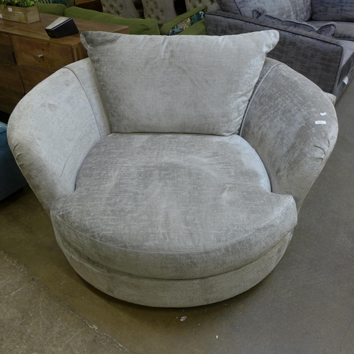 1568 - A pewter upholstered swivel love seat