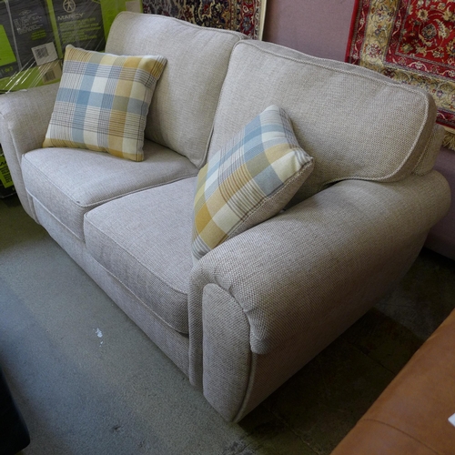 1593 - An oatmeal blue upholstered two seater sofa - no feet