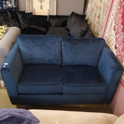 1602 - A deep ocean blue velvet two seater sofa