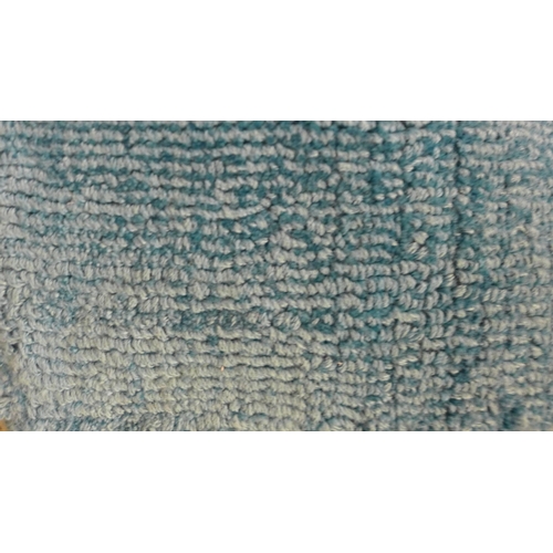 1633 - A duck egg blue rug, 3.40 x 2.40m