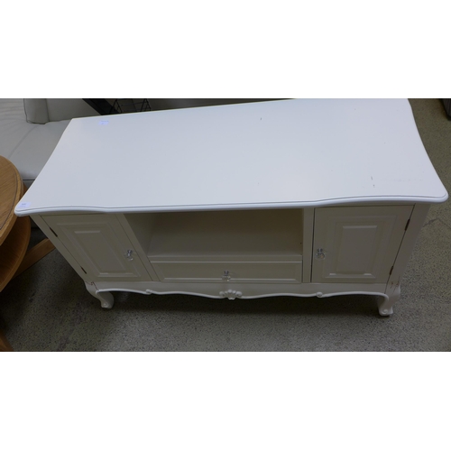 1642 - A white two drawer, two door media unit - damaged