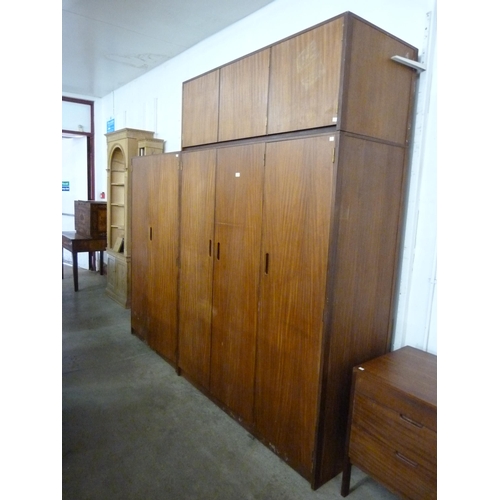 67 - A teak three piece bedroom suite, retailed by Heals of London