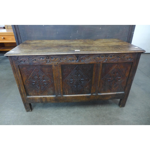 135 - A William III carved oak coffer