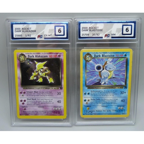 879 - Two Graded PG Graded Pokemon cards; 2000 Rocket Dark Blastoise and 2000 Rocket Dark Alakazam Holo