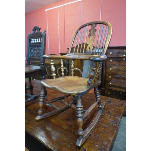 100 - A 19th Century elm and yew wood Windsor rocking chair