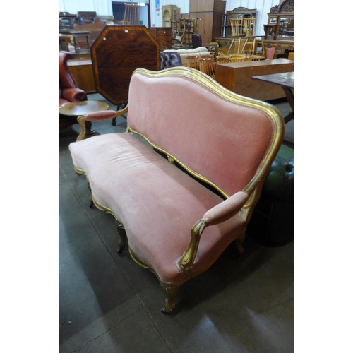 103 - A 19th Century French giltwood and pink fabric upholstered settee